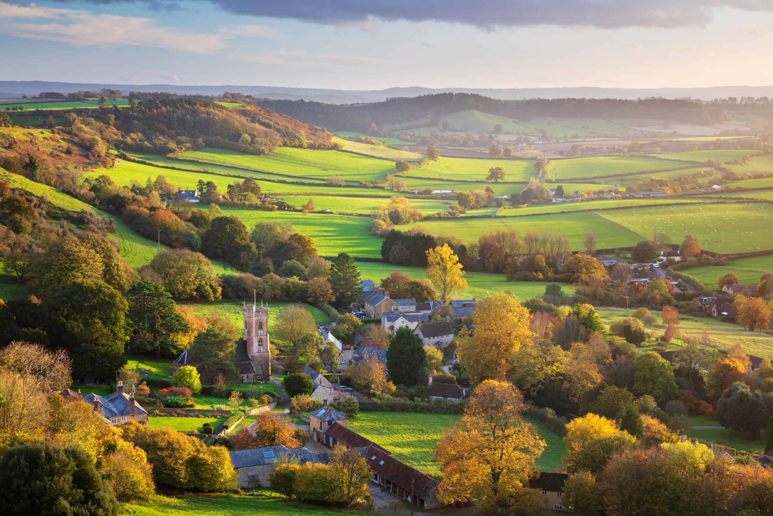 Cotswolds honey-stone village and rolling countryside, England